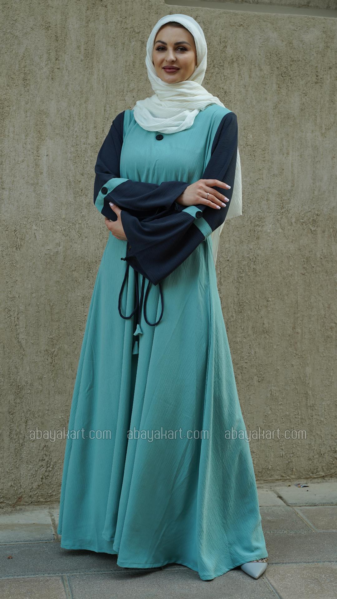 Bulk CEY Modest Dress with Show Buttons on the Front and Sleeves and an Attached Belt in Turquoise